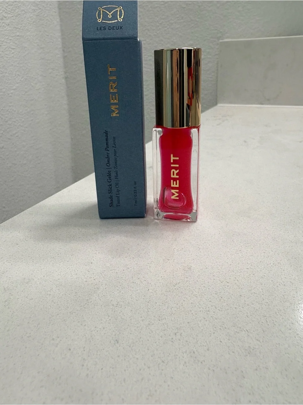 Merit Shade Slick Gelée Tinted Lip Oil — Sheer Pink